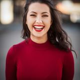 Sample: portrait of a smiling woman in a red sweater